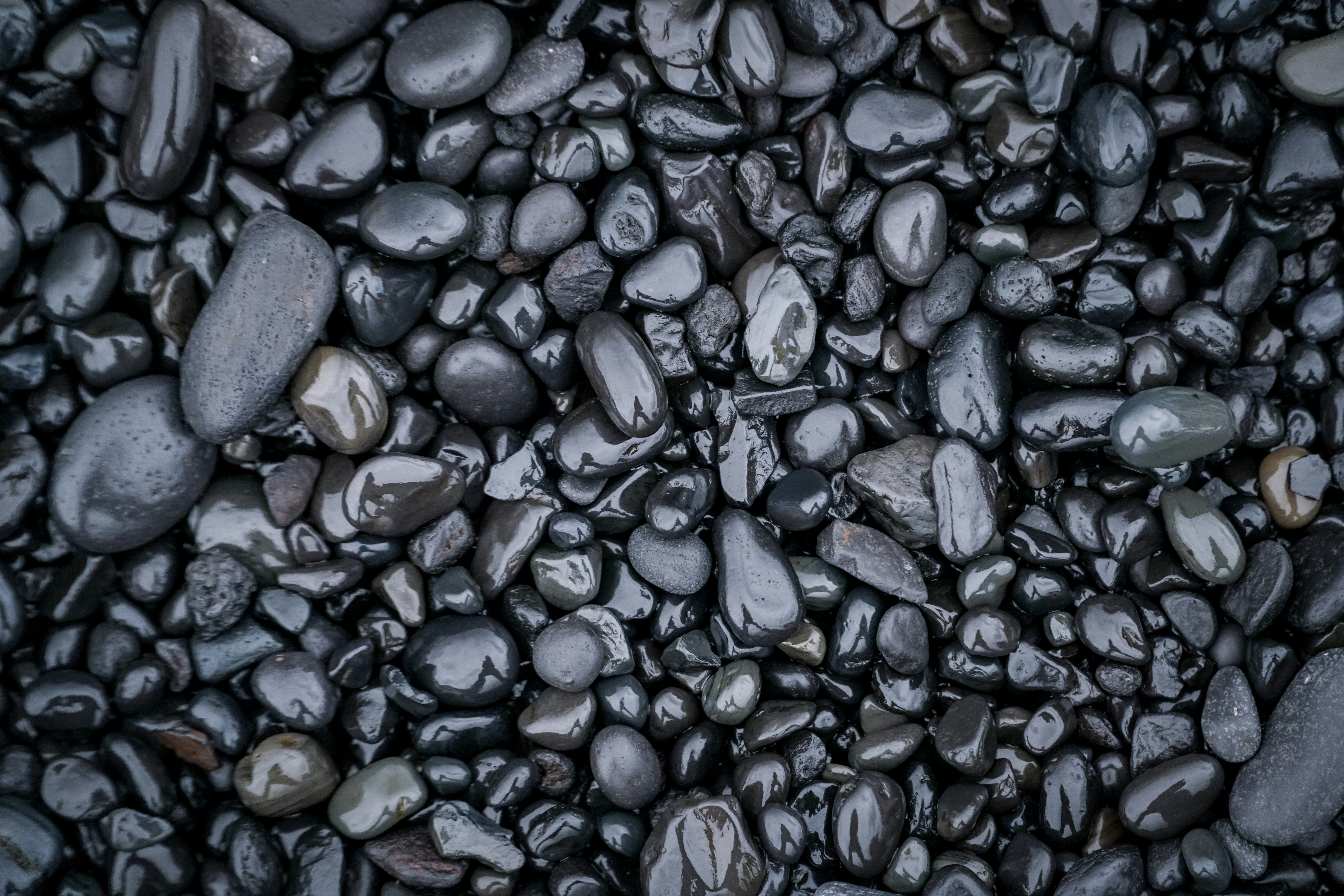 black and gray stones on black and white stones